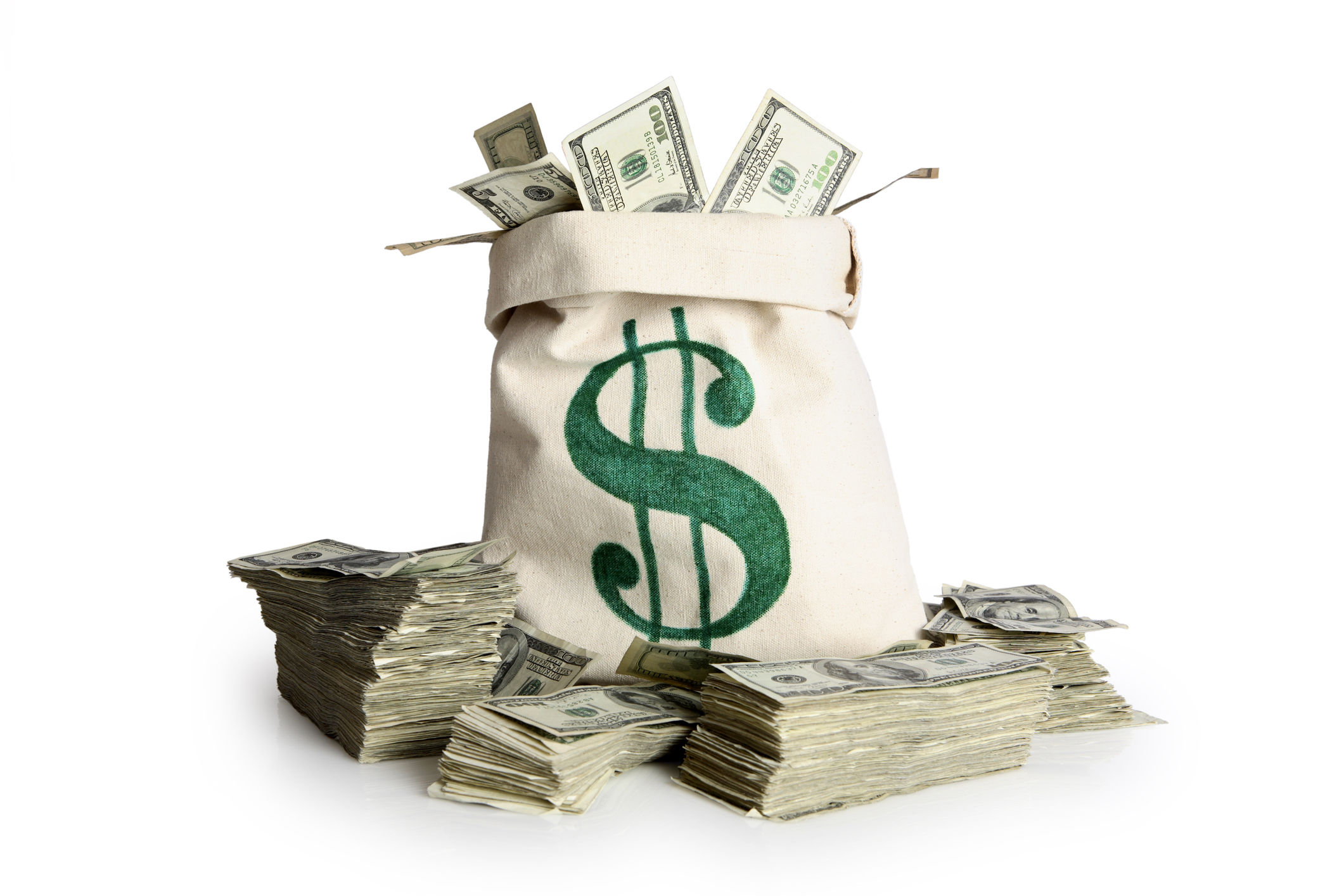 Money bag and stacks of cash