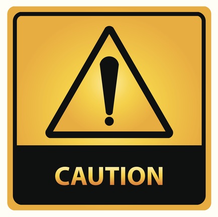 Caution text and sign.